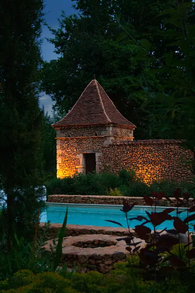 Grange - tower detail with pool and fire pit