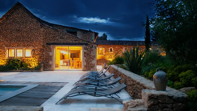 Grange - pool side by night